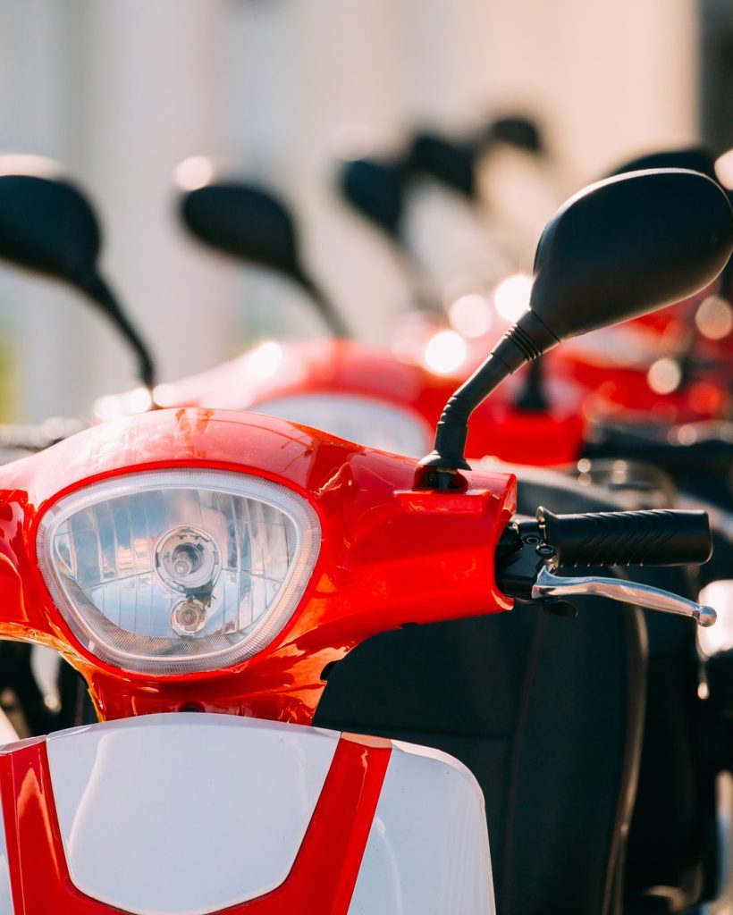 many-electric-motorbikes-motorcycles-scooters-parked-in-row-in.jpg